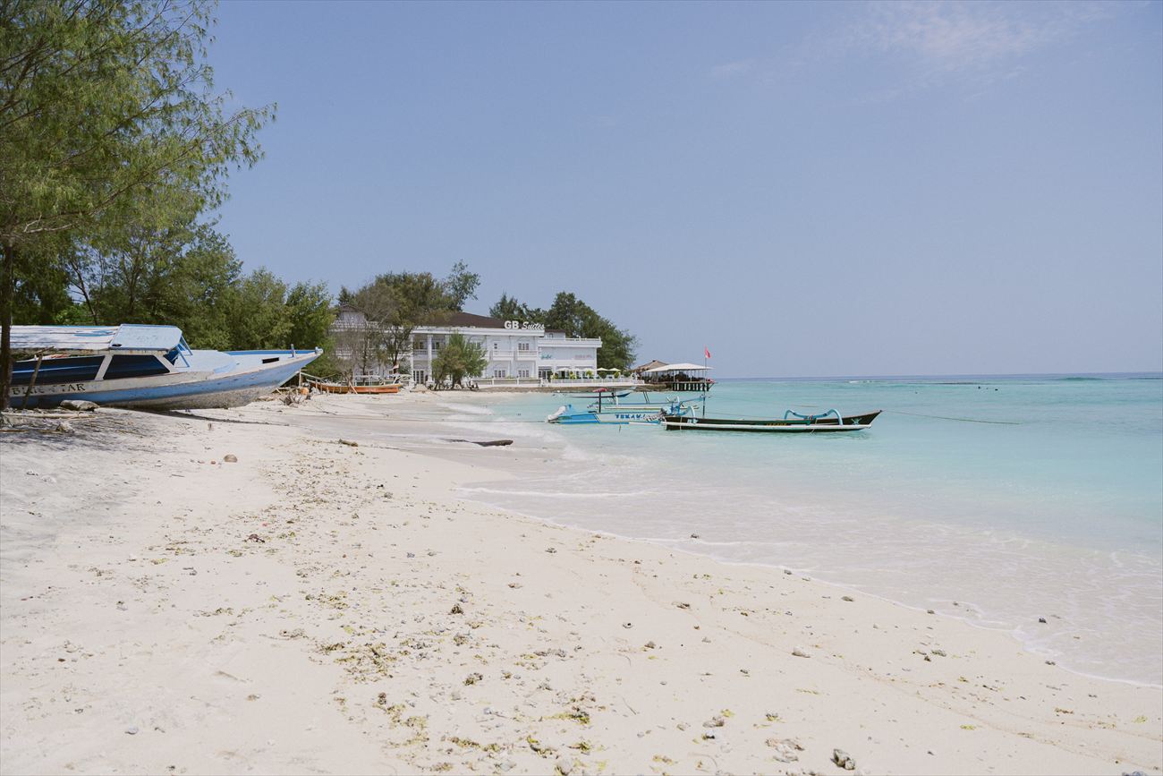 Fishing boats on the sand at low tide