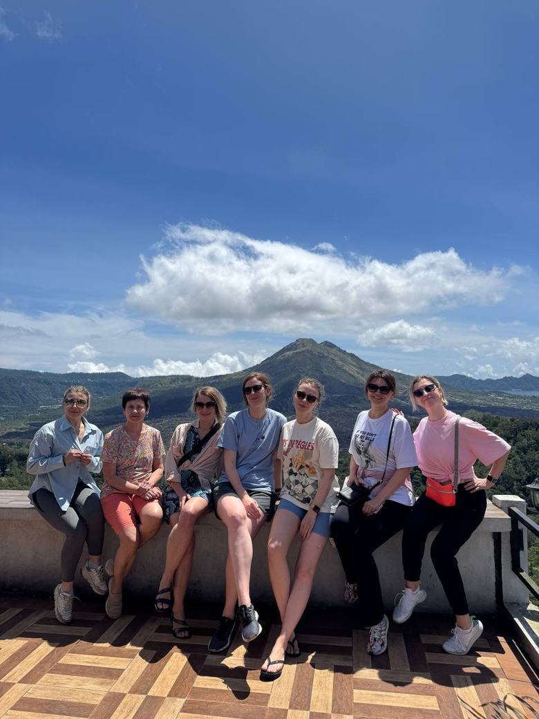 The group at a viewpoint over Mount Batur